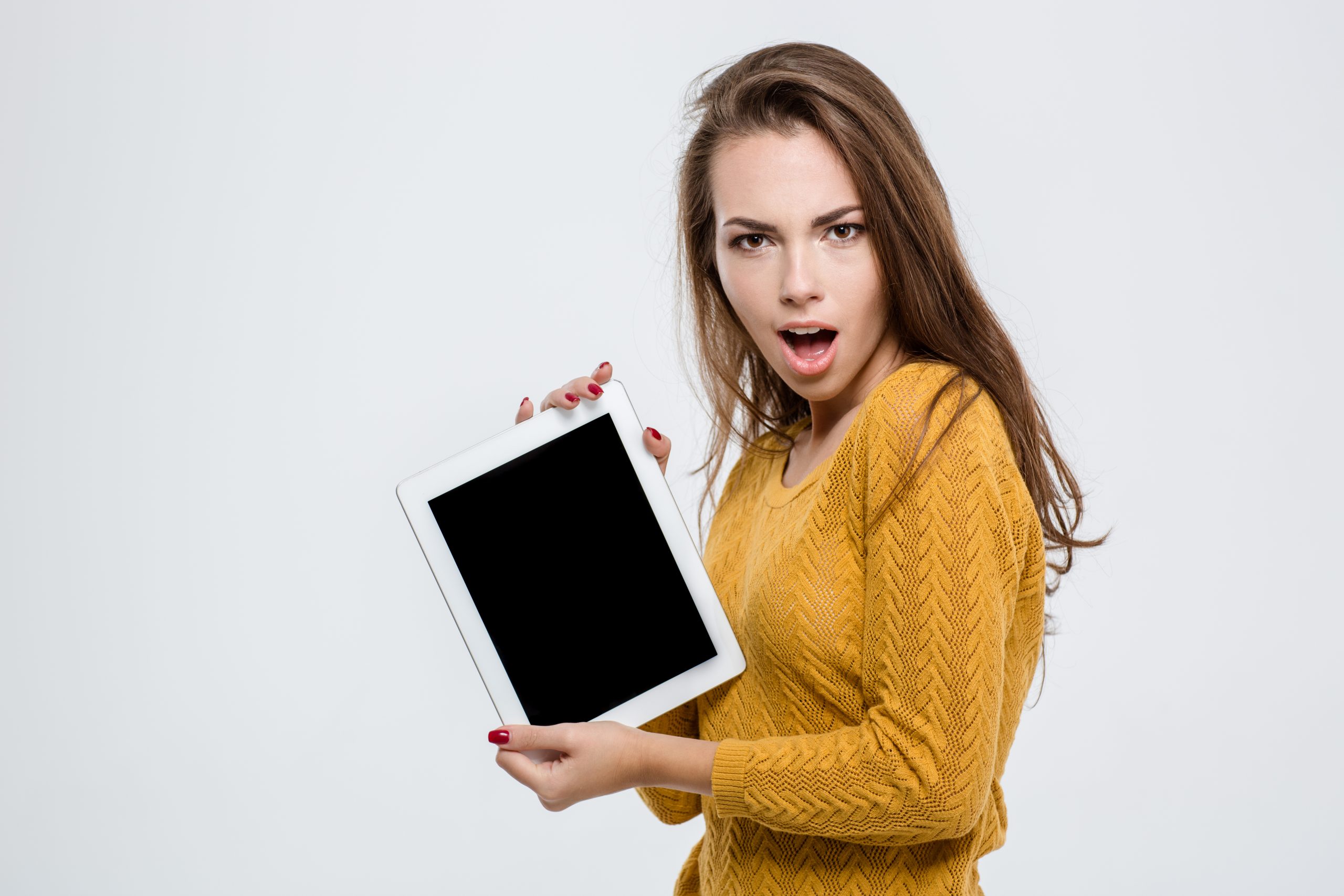 Girl holding a blank tablet. This blank space needs to be populated with social media links, to increase the effectiveness of the site